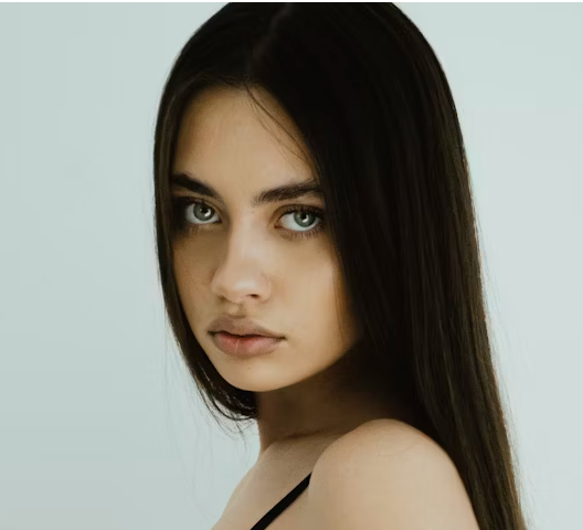 girl with blue eyes on a white background